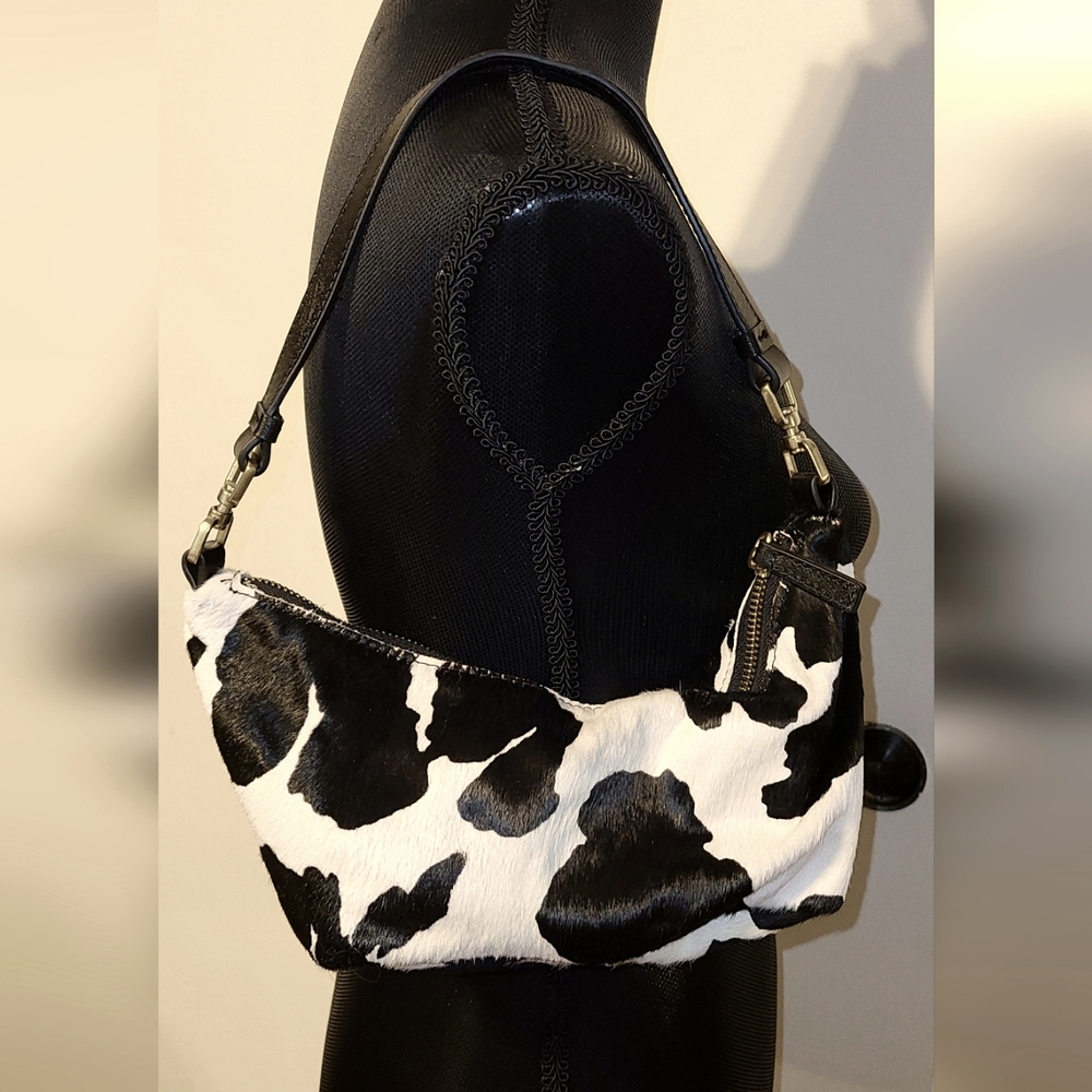Urban Outfitters baguette cow pattern shoulder bag